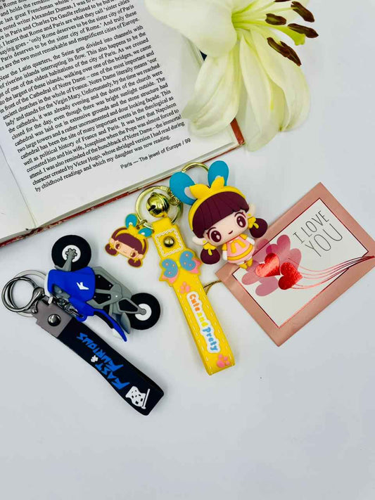 Keychain Set – Blue Bike Boy & Cute Doll Girl