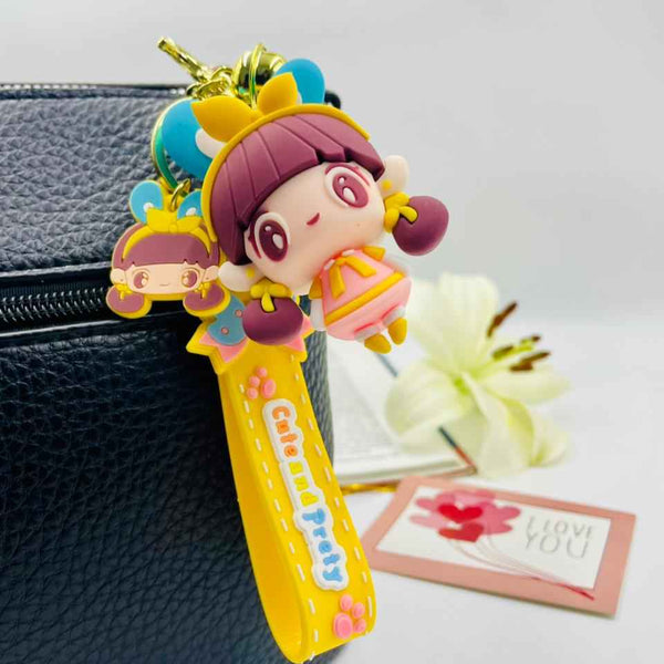 Keychain Set – Blue Bike Boy & Cute Doll Girl