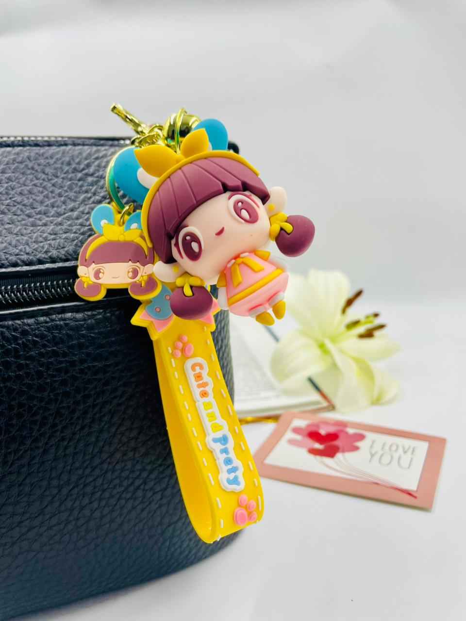 Keychain Set – Blue Bike Boy & Cute Doll Girl